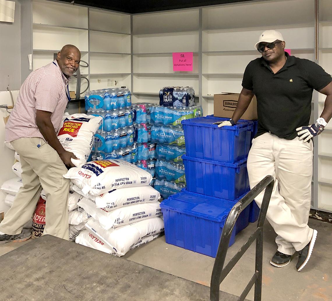 A delivery team poses for photo.