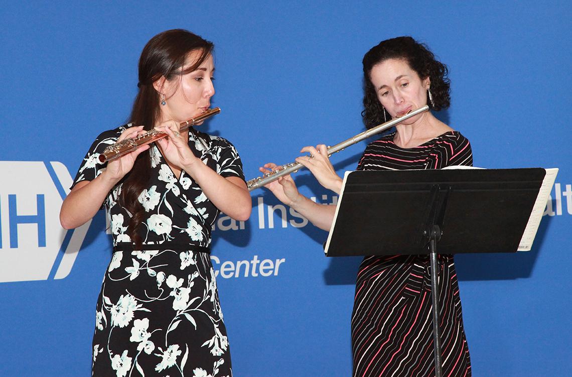 Frisof and Candelaria play flutes