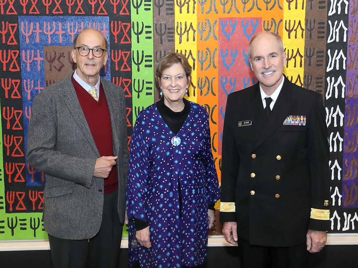 Dr. Olsen is greeted by Drs. Glass and Kilmarx.