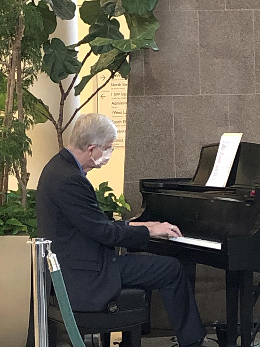 Dr. Collins plays piano.