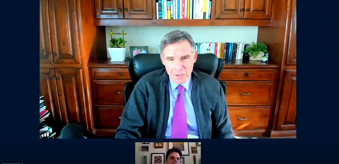 Topol speaks in his office