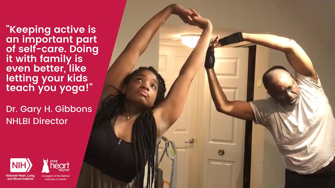 Two people practice yoga