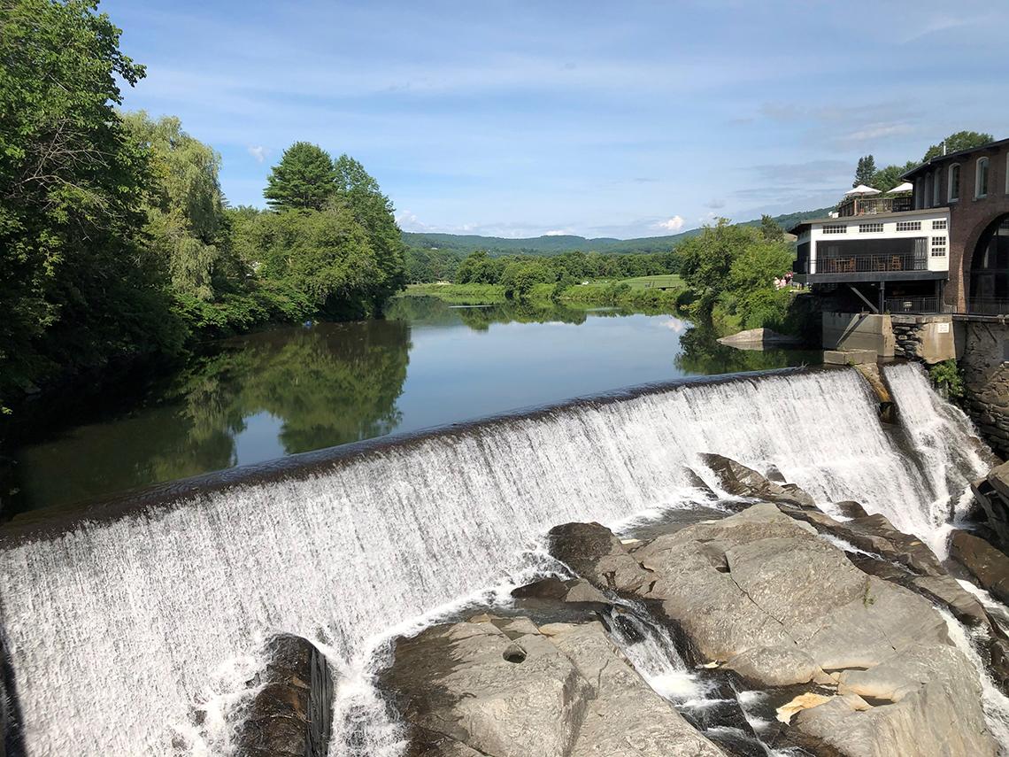 River view with waterfall and trees