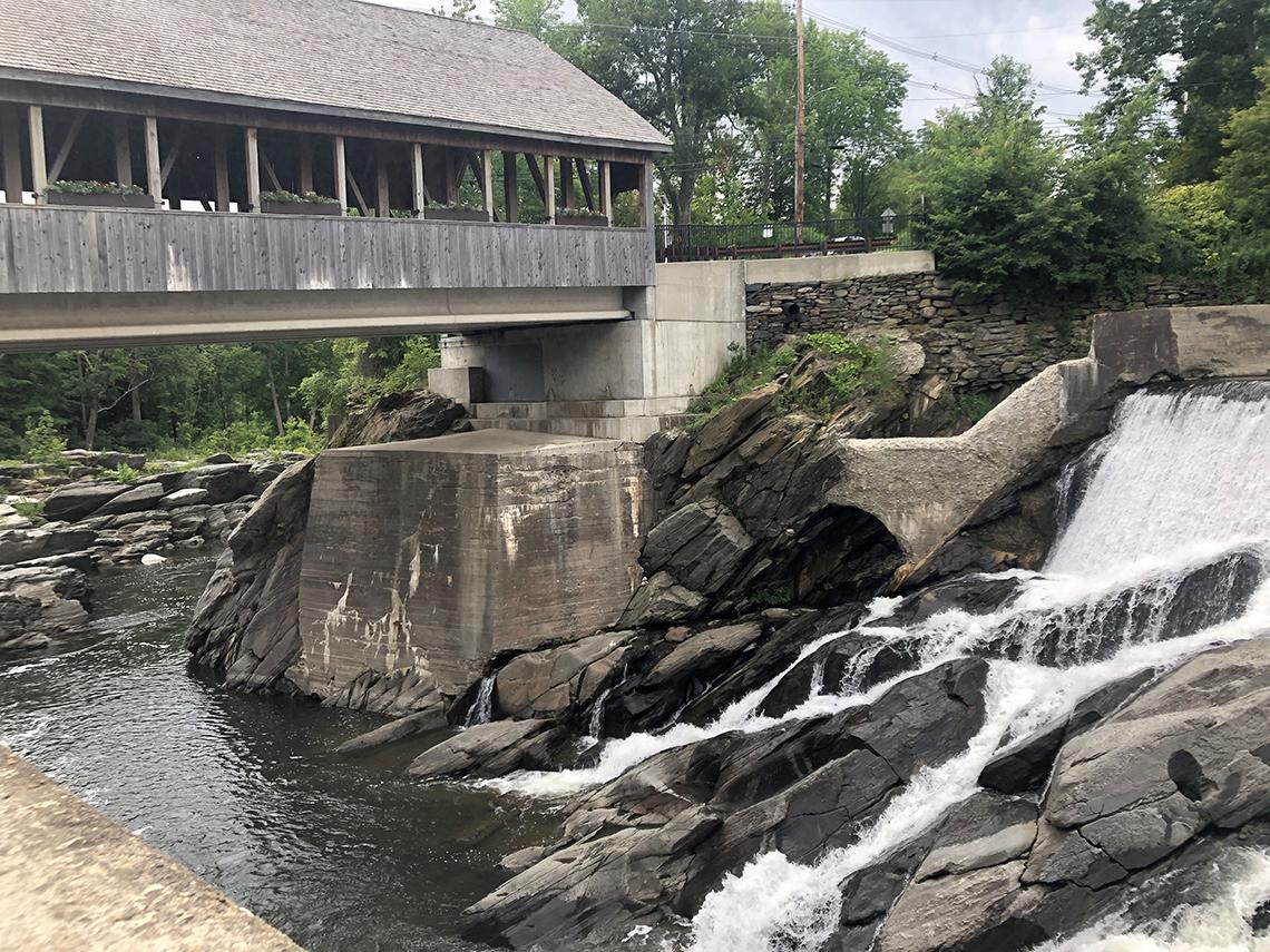 River view with structure over waterfall