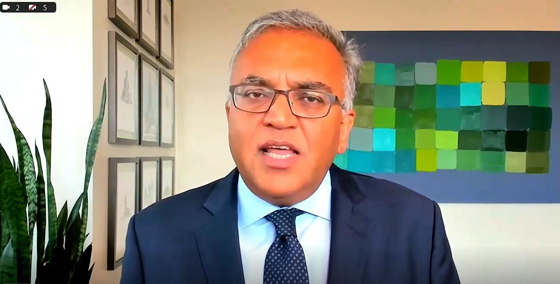 Jha delivers his virtual lecture from his home office