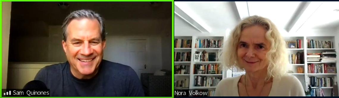 A screen shot shows a smiling Quinones and a smiling Dr. Nora Volkow, who is seated in front of a row of book shelves
