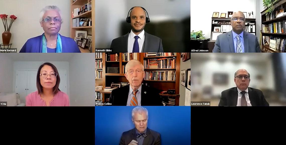 Six panelists and an ASL translator participated in the town hall