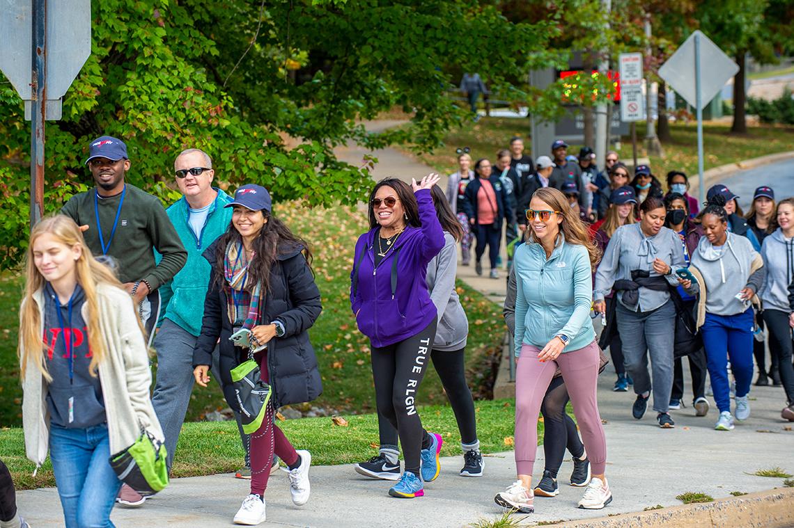 A group of walkers traveling on the path