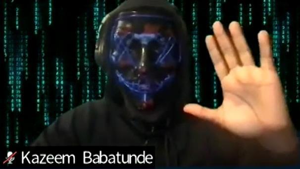 Screenshot of dark translucent head with hands facing palm out