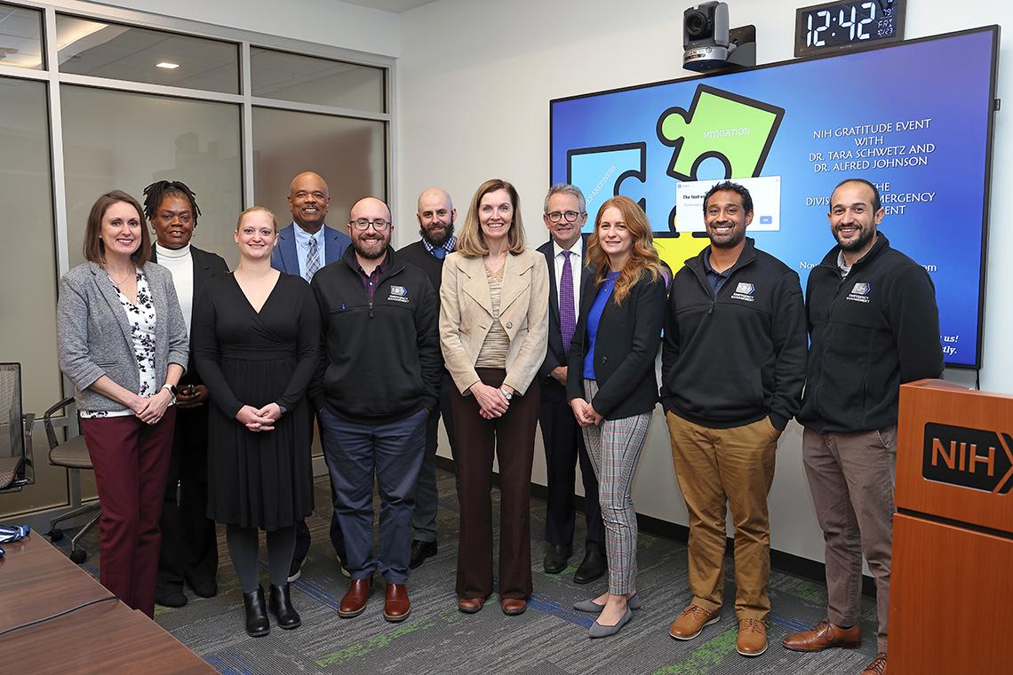 A group photo featuring DEM Staff and NIH leadership