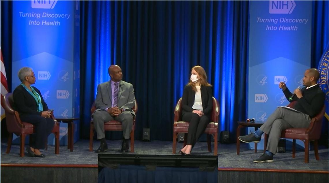 Bernard, Johnson and Schwetz participate in a panel with Gibbs moderating