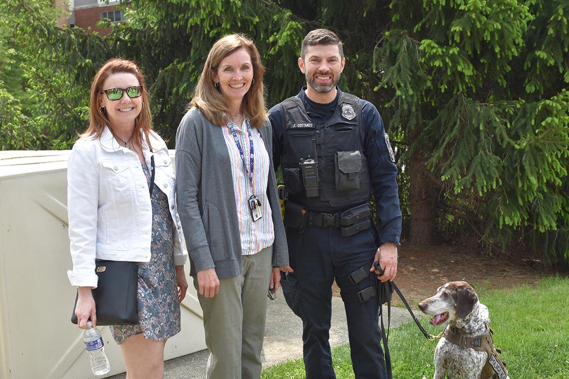 McGowan poses with Costanzo and dog on a leash