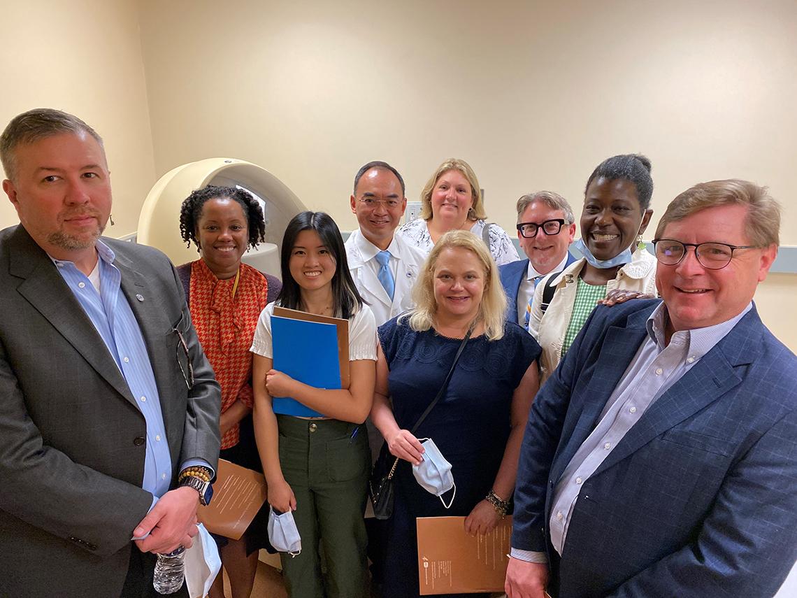 A group photo featuring fellows and an NIH researcher