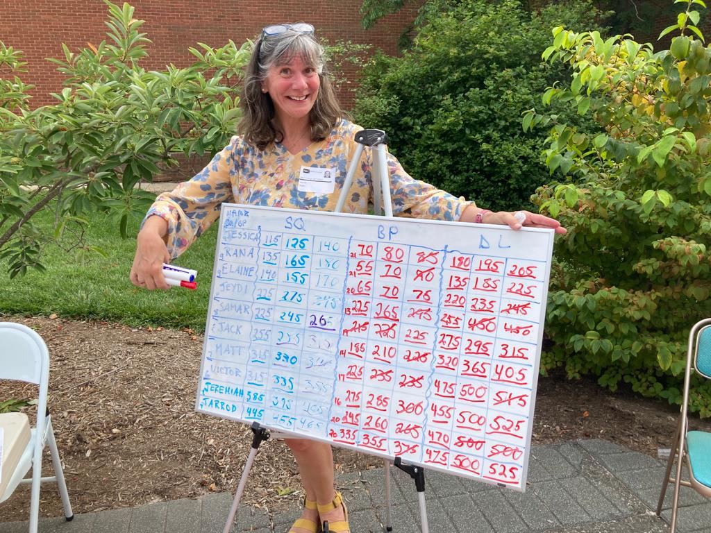 Sipes keeps score on a whiteboard