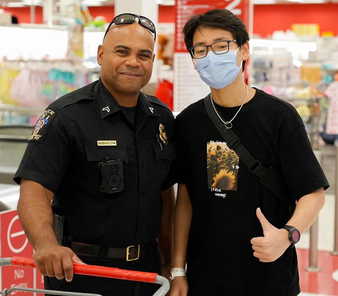 Two police officers pose together