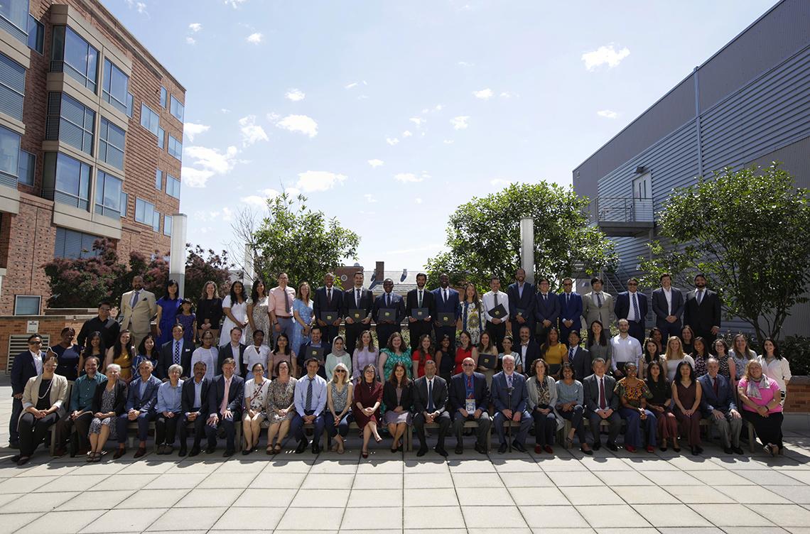 The graduating class outside of the Clinical Center