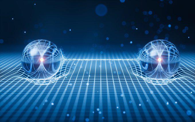 The image depicts quantum entanglement