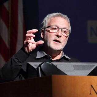 Dr. Basbaum speaks on stage.