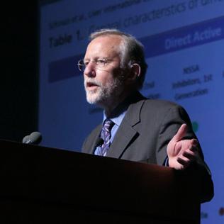 Dr. Rice speaks at podium.