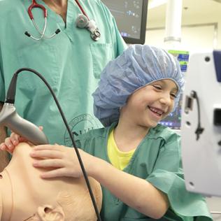 Elena  intubates a mock patient