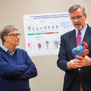 Gates and Graham look at 3-D model.