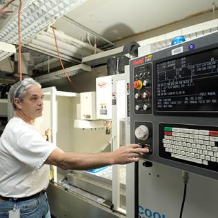 Metger with wall-size panel keyboard, screen and equipment knobs