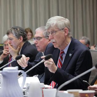 Dr. Collins presides at ACD meeting.