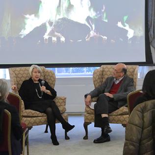 Dr. Glass speaks with Peace Corps director.