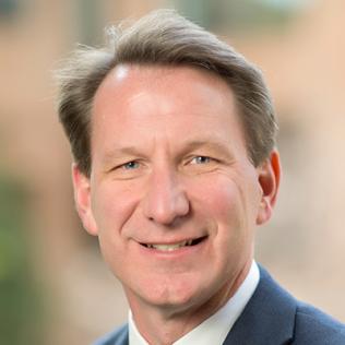 Dr. Ned Sharpless smiles