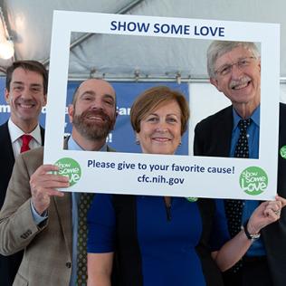 Dr. Christopher Austin, Keith Lamirande, Deborah Rutter and Dr. Francis Collins pose for a photo