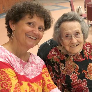 Martina Lavrisha and her mother smiling into camera