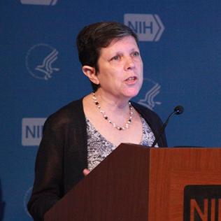 Dr. Klion speaks at podium.