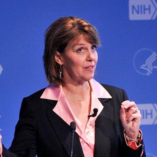 Dr. Gaudet speaks at a podium