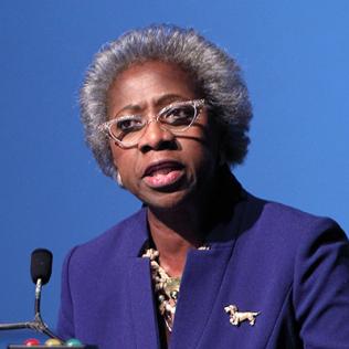 Dr. Hannah Valantine speaks at town hall meeting.