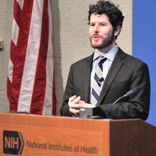 Dr. Bulea is speaking at podium