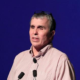 Dr. Betzig standing at the podium