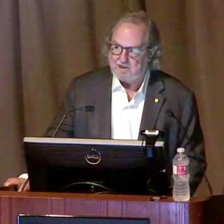 Dr. Allison at lectern