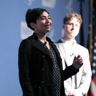 Drs. Vallabh and Minikel on stage together