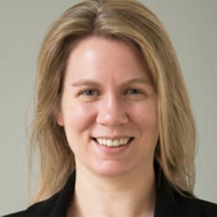 Head shot of a smiling Robinson