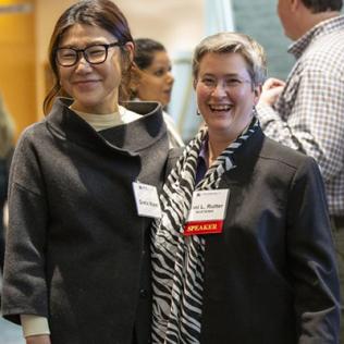 Moon and Rutter smile in the halls of Natcher Conference Center during a break in the day's events.