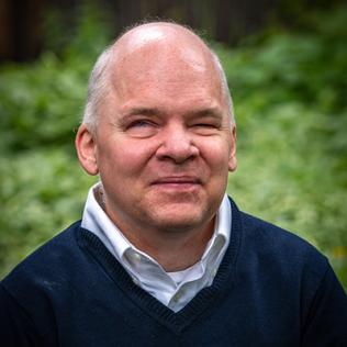 Dr. Matthew Weed outside, in garden