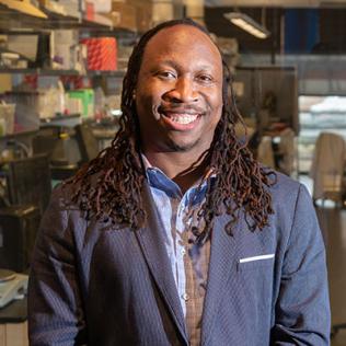 Platt smiling in the lab