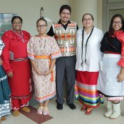 A group of native scholars pose together.