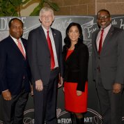 NIH leaders wear red for the occasion.