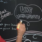 Chalkboard message urges living mindfully.