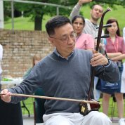 Dr. Guan plays the erhu.