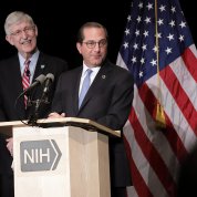 Azar at the podium with Collins