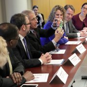 Azar attends a briefing with NIH leaders.