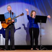 Dr. Collins and Dr. Wolinetz perform a song 