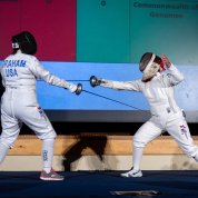 Two women fence